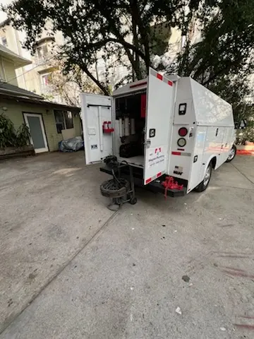 Magnet Plumbing service vehicle on-site for Grease Trap Cleaning in Ave Maria